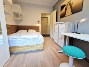 Postel nebo postele na pokoji v ubytování Scandian Apartments - City Hub Tallinn