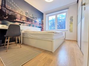 Postel nebo postele na pokoji v ubytování Scandian Apartments - City Hub Tallinn