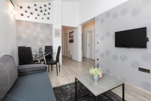 Televízia a/alebo spoločenská miestnosť v ubytovaní Apartment Kosic n2 beautiful & cosy