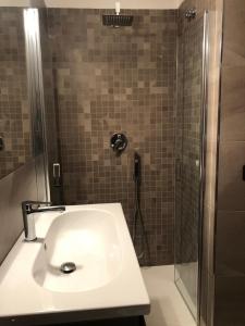 A bathroom at FORIA 58 APARTAMENTS