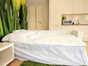 Kuchyň nebo kuchyňský kout v ubytování Scandian Apartments - City Hub Tallinn