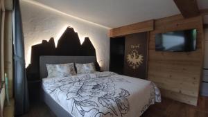 Voodi või voodid majutusasutuse Chalet Heidi toas