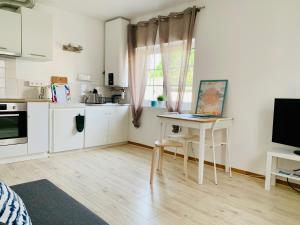 Kuchyň nebo kuchyňský kout v ubytování APPARTEMENT T2 GUETHARY CENITZ