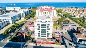 an aerial view of a city with the ocean at Aselia Hotel Trabzon in Trabzon