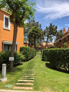 Zahrada ubytování Sol, playa y golf en urbanización de lujo.