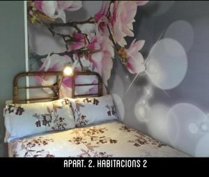 A bed or beds in a room at Casa Tonya