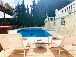 Bazén v ubytování Casa Geneviève Costa del Sol nebo v jeho okolí
