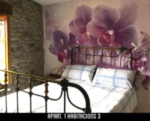 A bed or beds in a room at Casa Tonya