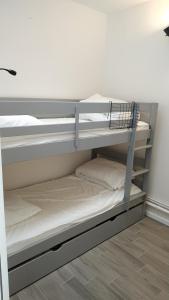 Posteľ alebo postele v izbe v ubytovaní Charmant et lumineux logement, au cœur de Cabourg
