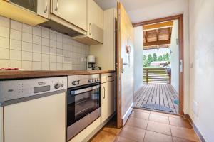 A kitchen or kitchenette at Ferienparadies Sabina Latsche