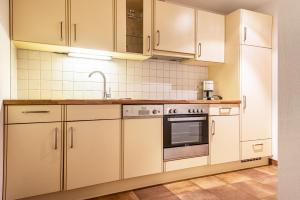 A kitchen or kitchenette at Ferienparadies Sabina Latsche