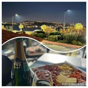 una botella de cerveza y una bandeja de comida en una mesa en front de mer plage de la Nartelle sainte maxime FRANCE **** en Sainte-Maxime