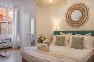 Posteľ alebo postele v izbe v ubytovaní Ensemble rooms di Vayadù