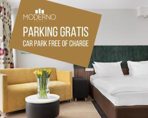Posteľ alebo postele v izbe v ubytovaní Hotel Moderno Poznań