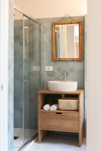 Kúpeľňa v ubytovaní Ensemble rooms di Vayadù