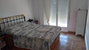 Łóżko lub łóżka w pokoju w obiekcie Cómodo piso en Cardeña (Córdoba)