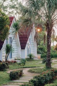 Zahrada ubytování Seaside Villa & Muse Beach Resto