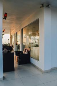 Setusvæði á Seaside Villa & Muse Beach Resto