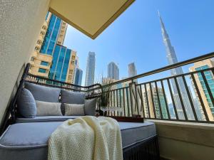 Postel nebo postele na pokoji v ubytování HiGuests - Amazing Apartment overlooking Burj Khalifa!