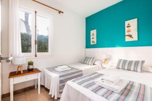 Posteľ alebo postele v izbe v ubytovaní Villa Acuario by Villa Plus + 37 fotografií