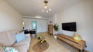 TV a/nebo společenská místnost v ubytování Apartamento Luz de Luna by Family Homes
