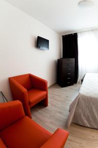 TV a/nebo společenská místnost v ubytování Hotel Cajeta