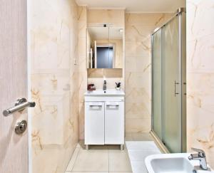 Koupelna v ubytování Hotel Dompes
