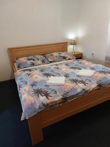 Posteľ alebo postele v izbe v ubytovaní Apartmany-Anna