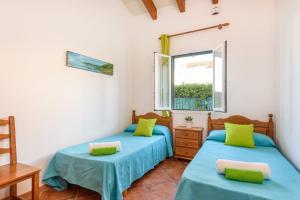 Postel nebo postele na pokoji v ubytování Villa Tonia by Villa Plus
