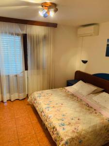 Postel nebo postele na pokoji v ubytování FUNTANA-MIA ROOMS B&B