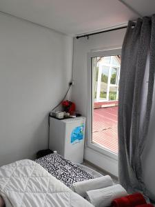 Postel nebo postele na pokoji v ubytování AMBIENT Geavidan 2