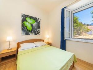 Ένα ή περισσότερα κρεβάτια σε δωμάτιο στο Apartments M&F +37 φωτογραφίες