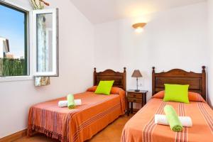 A bed or beds in a room at Villa Noa by Villa Plus