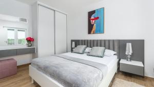 Posteľ alebo postele v izbe v ubytovaní Villa Audrey