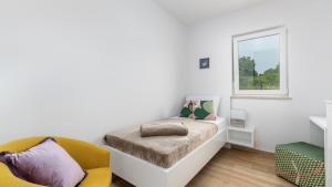 Posteľ alebo postele v izbe v ubytovaní Villa Audrey