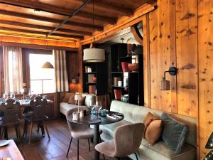 Posezení v ubytování Hôtel Le Grand Chalet Favre