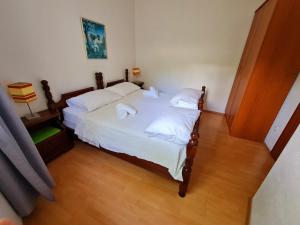 Postel nebo postele na pokoji v ubytování Apartments Silvana