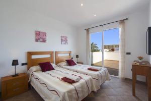 Postel nebo postele na pokoji v ubytování Villa Natasha by Villa Plus + 27 fotografií