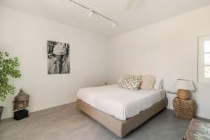Postel nebo postele na pokoji v ubytování Beautiful, sunny apartment in Mykonos Town