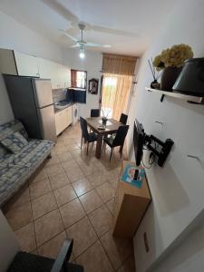 an aerial view of a kitchen with a table and a room at Casa Ambrosia Tropea in Tropea