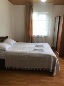Guest House Gogia 객실 침대