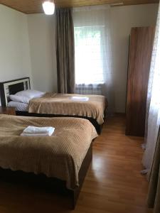 Postel nebo postele na pokoji v ubytování Guest House Gogia
