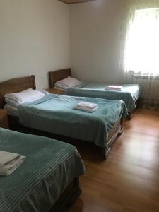 Guest House Gogia 객실 침대