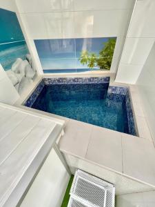 an overhead view of a swimming pool in a house at El Pont Alicante Apartments in Alicante