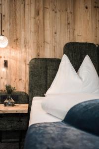 Postel nebo postele na pokoji v ubytování Hotel Goldknopf