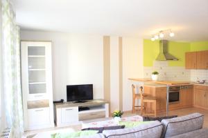 Η κουζίνα ή μικρή κουζίνα στο City-Appartement 12.1. +8 φωτογραφίες