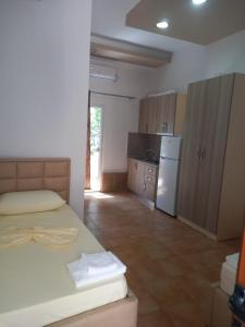 Kuchyň nebo kuchyňský kout v ubytování Alexander Stay Hotel