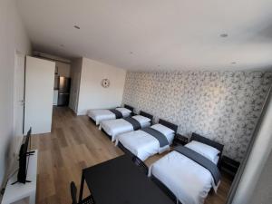 Postel nebo postele na pokoji v ubytování RYNEK 2 DUKLA- POKOJE I APARTAMENTY