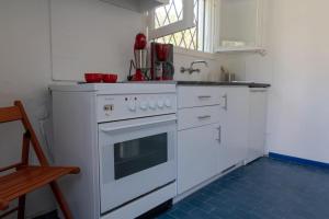 Kuchyň nebo kuchyňský kout v ubytování Olive terra holiday aparments