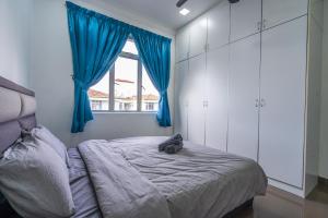 Postel nebo postele na pokoji v ubytování Spacious 3-bedroom with Pool for 6 - Subang Jaya + 11 fotografií